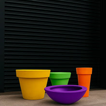 Load image into Gallery viewer, our oversized Biggie plant pots in yellow, green, purple and orange — durable extra large outdoor planters for residential and commercial spaces